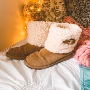 UGG boots with exposed fur on the outside